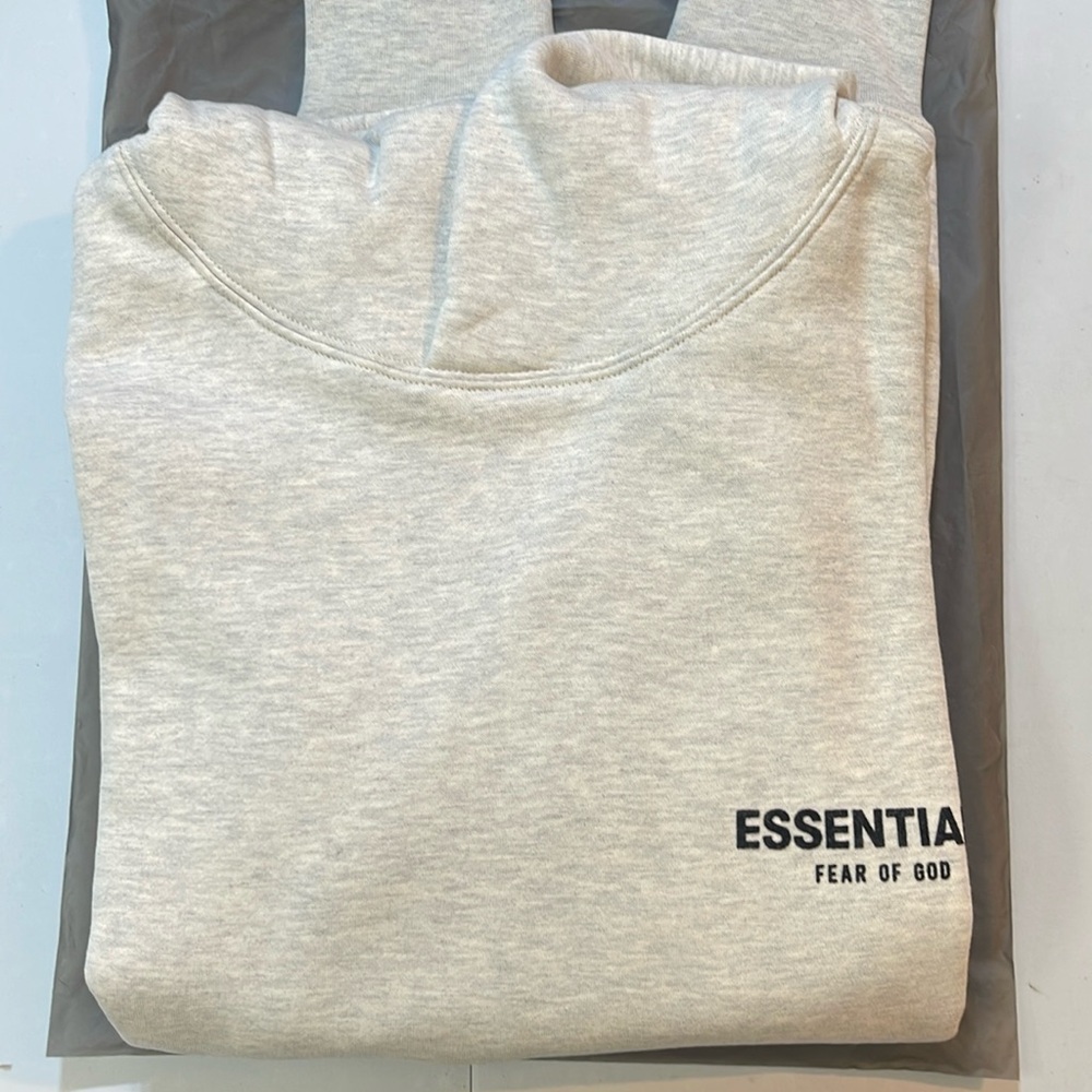 fear of god essentials light oatmeal hoodie 22